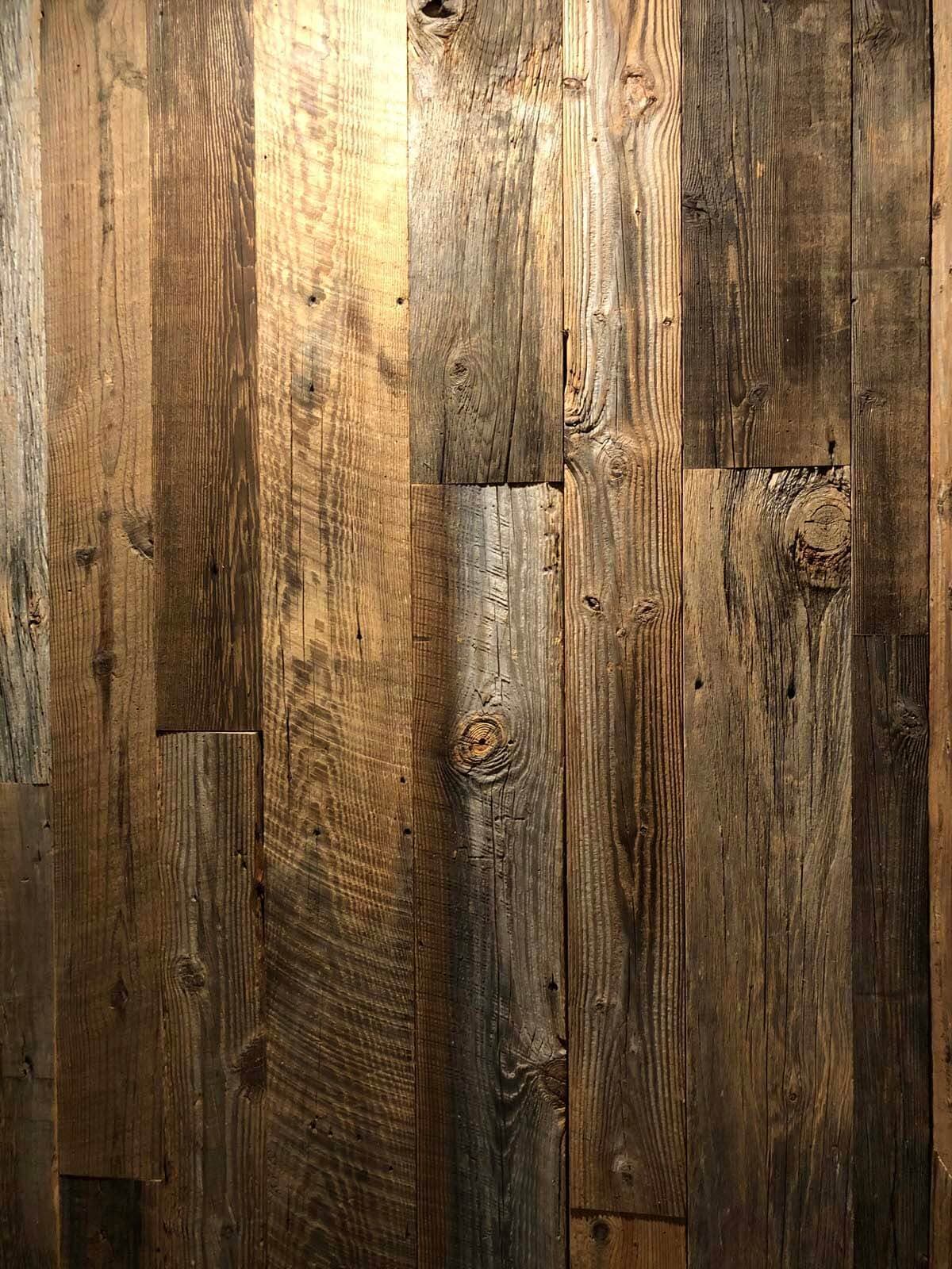 Original Surface Pine Wall Cladding planks in vertical alignment
