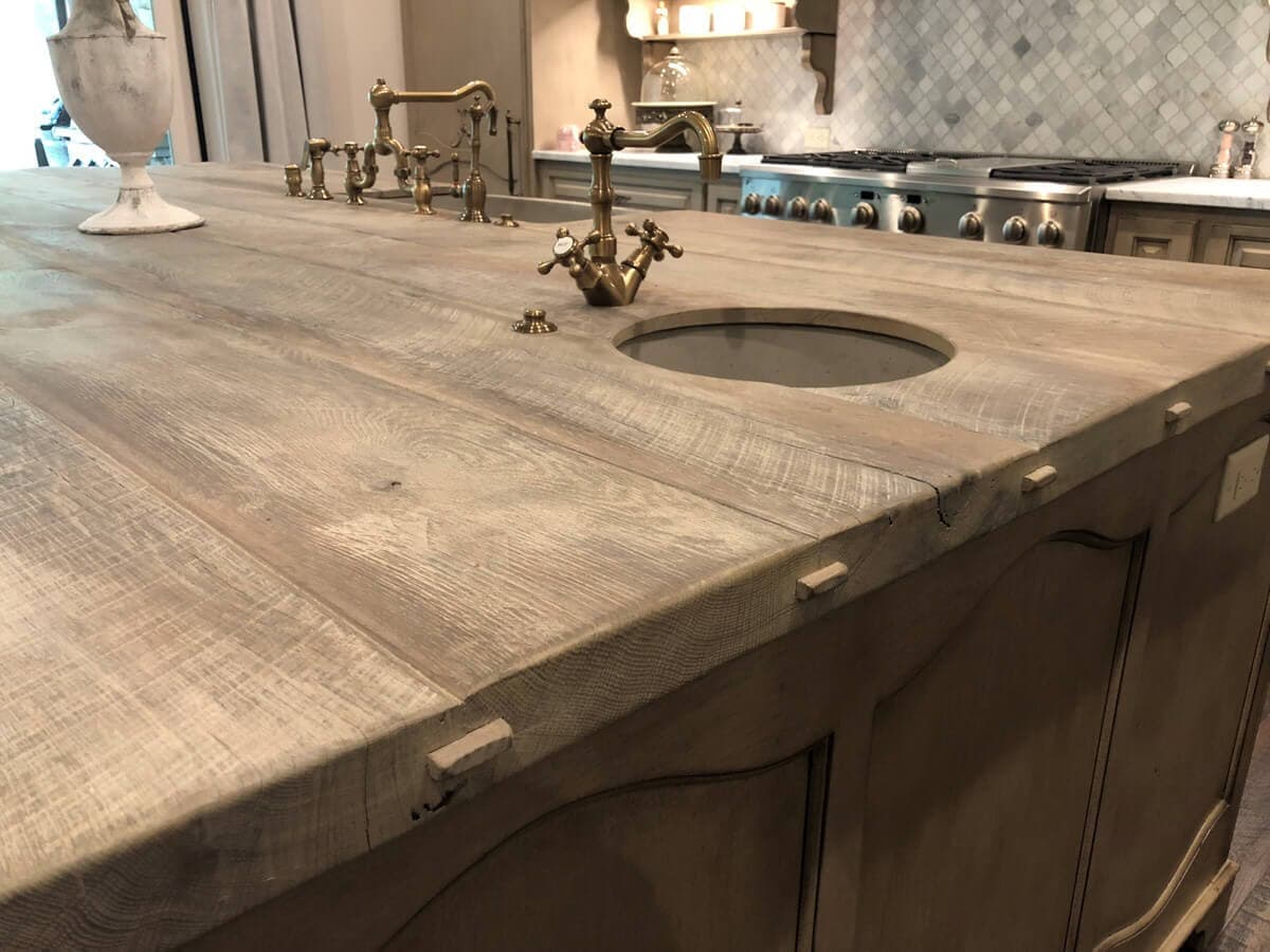Reclaimed Counter Top side biscuit details with a sink and brass fixture
