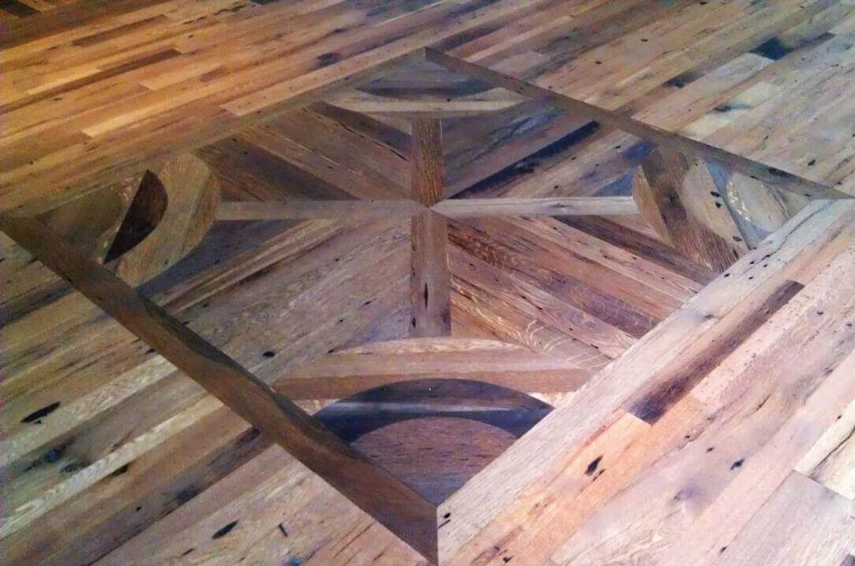 Antique oak flooring with beautiful inlay.