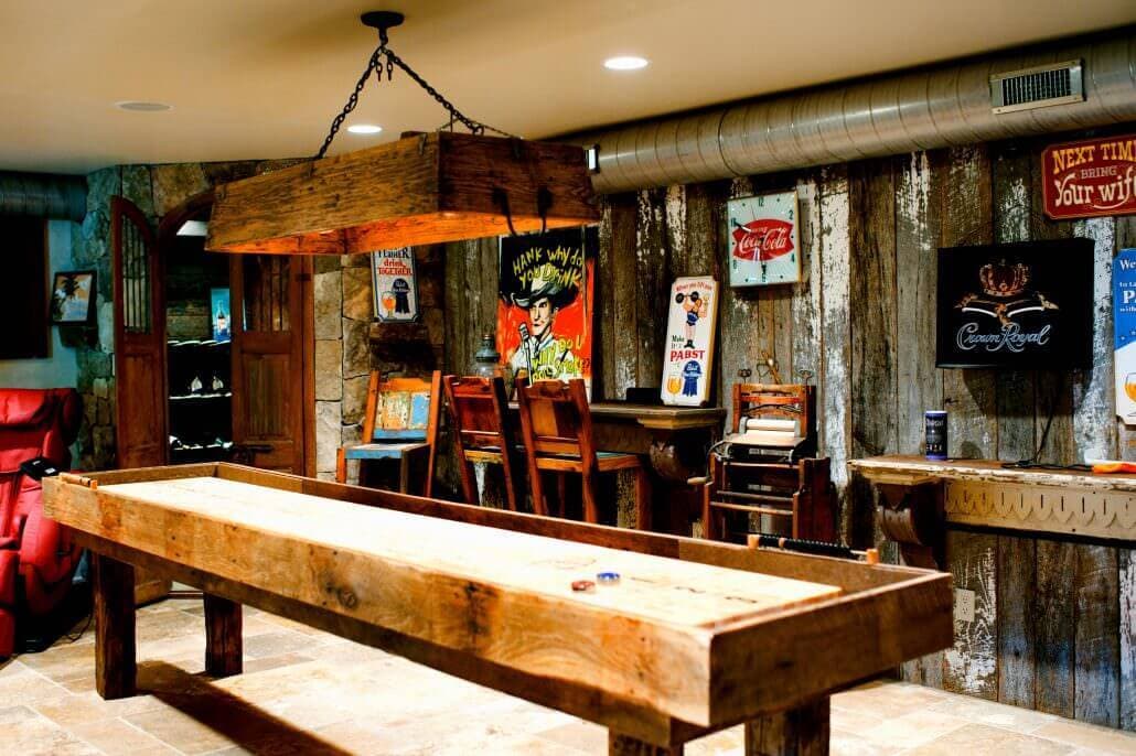 painted siding and barn wood around a game table in a hickory nc basement man cave