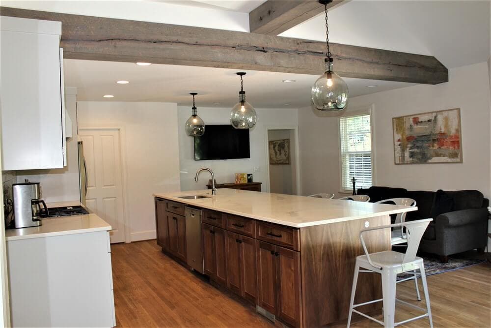 Reclaimed wood beams over kitchen island.