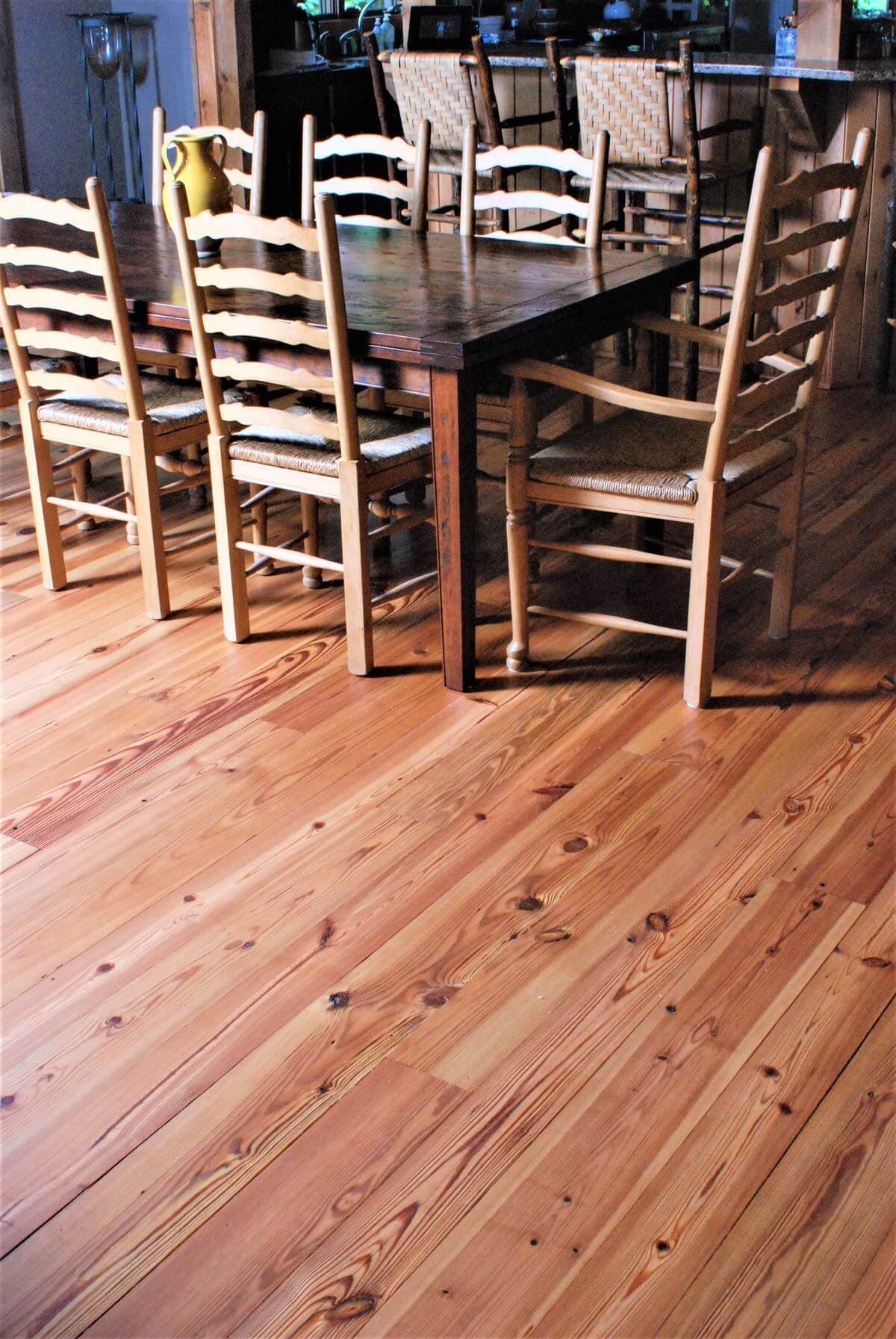 Beautiful wood flooring in dining room showcase refined wood aesthetic.
