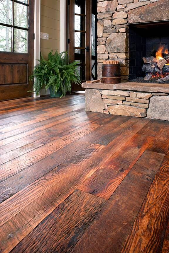 Carolina Character Oak flooring in living room with open fireplace.