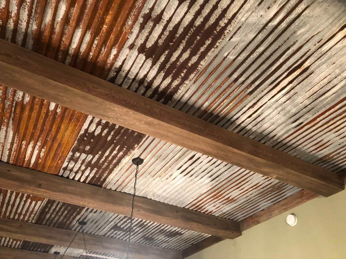 Circle sawn Doug Fir box beams and a rusty tin ceiling