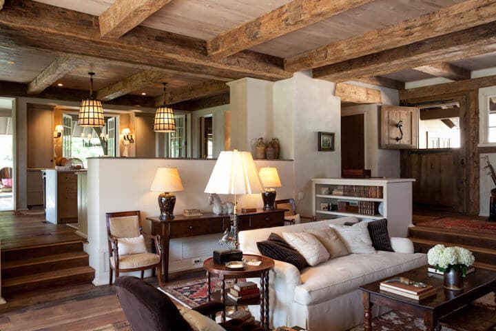 Hand hewn beams frame a living area in Tryon NC