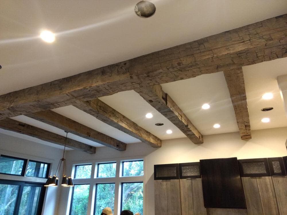 Hand hewn ceiling beams with a horizontal header