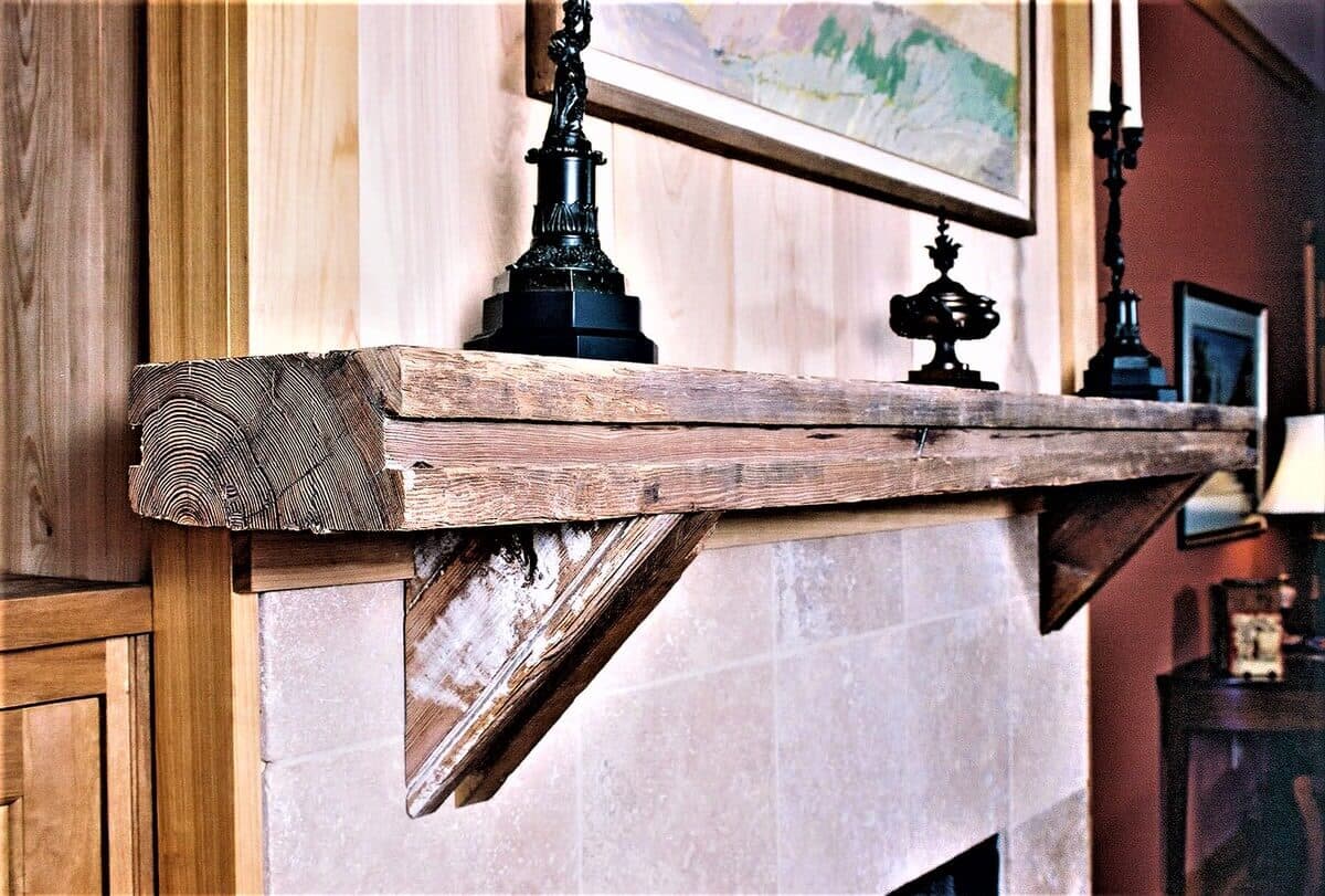 heart pine original surface mantel with small corbels and unfinished.
