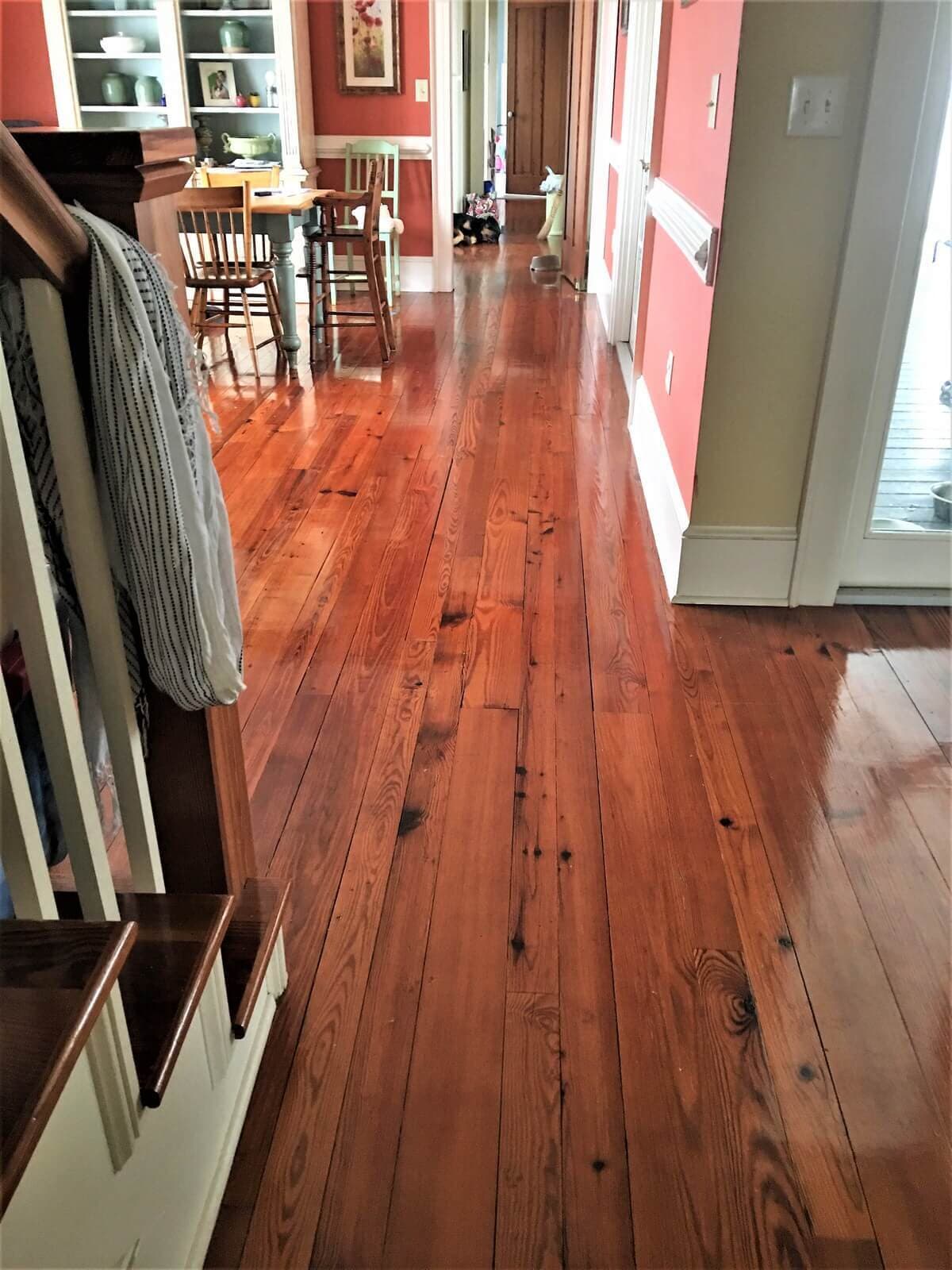 Heart pine plain sawn  flooring in a pink room in East Amherst, ny