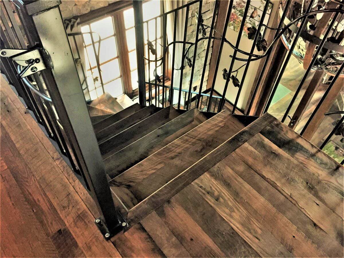 character reclaimed oak stairway and ironwork rails in lake toxaway, nc