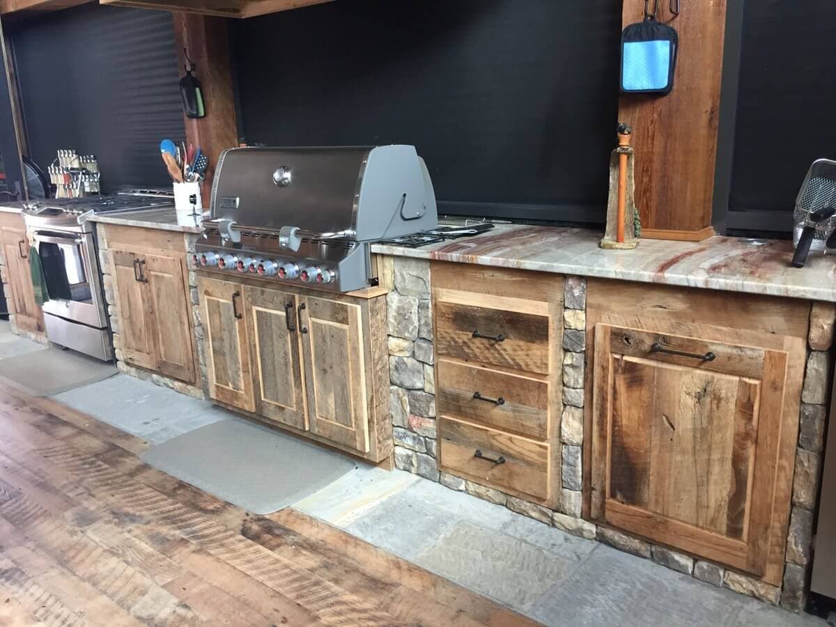 Reclaimed wood cabinets in an outdoor kitchen