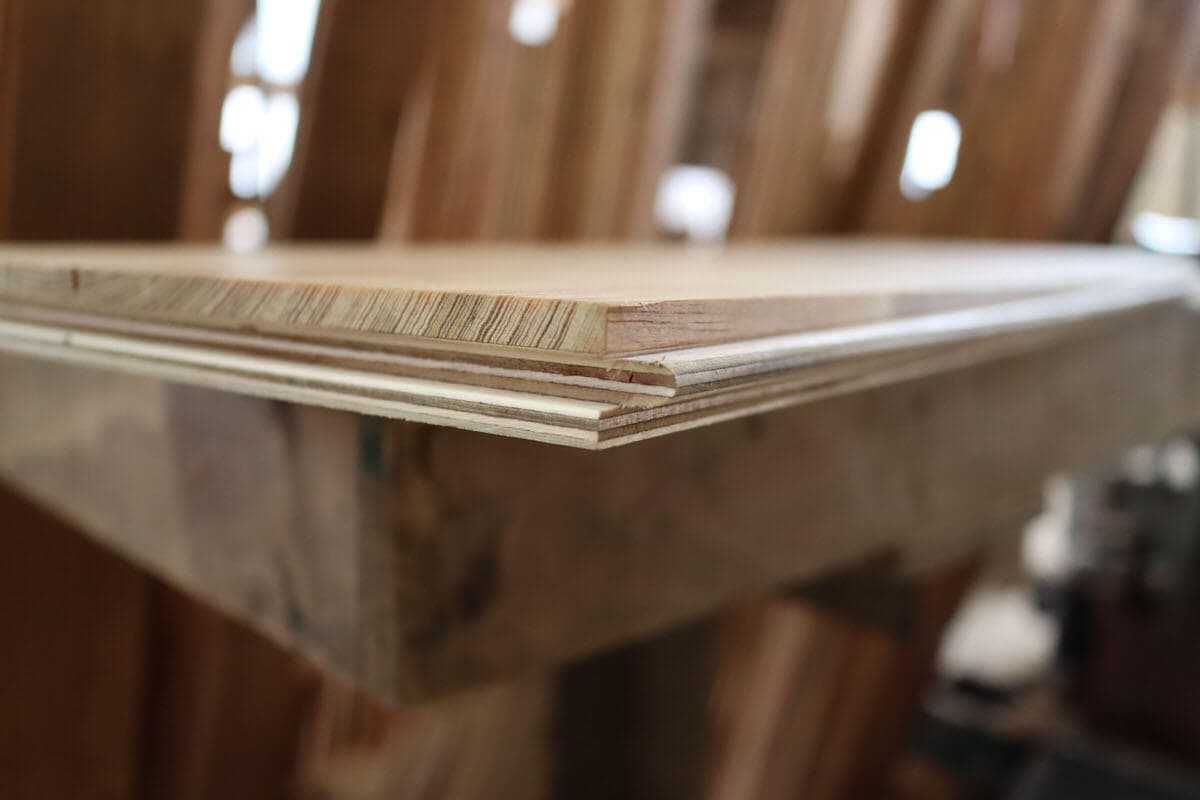 Reclaimed engineered floor board up close.