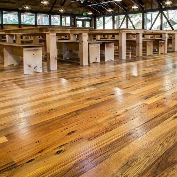 Reclaimed hardwood flooring in Whole Log classic style.