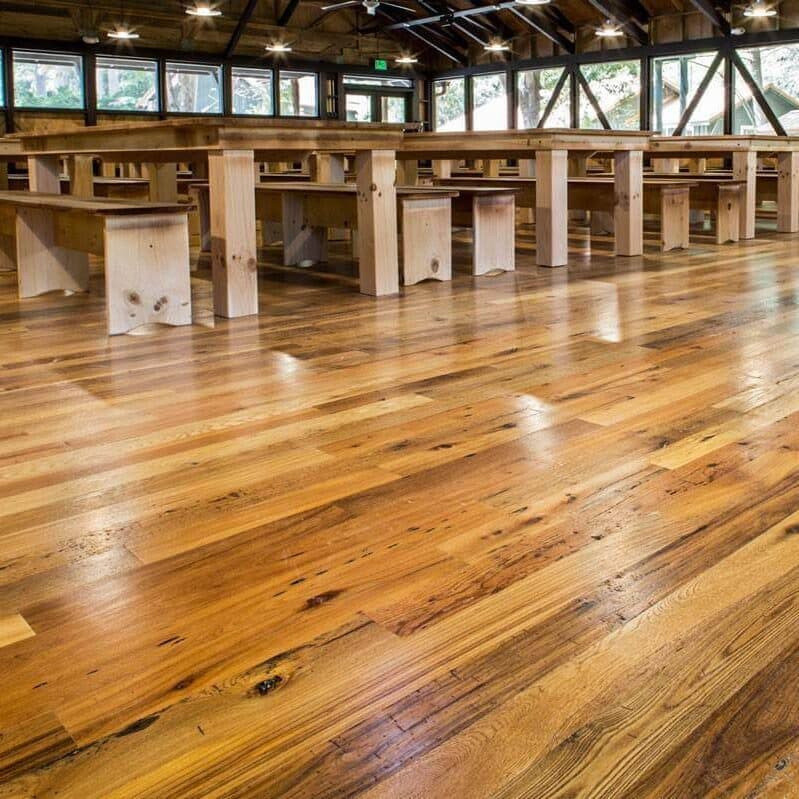 Reclaimed hardwood flooring in Whole Log classic style.