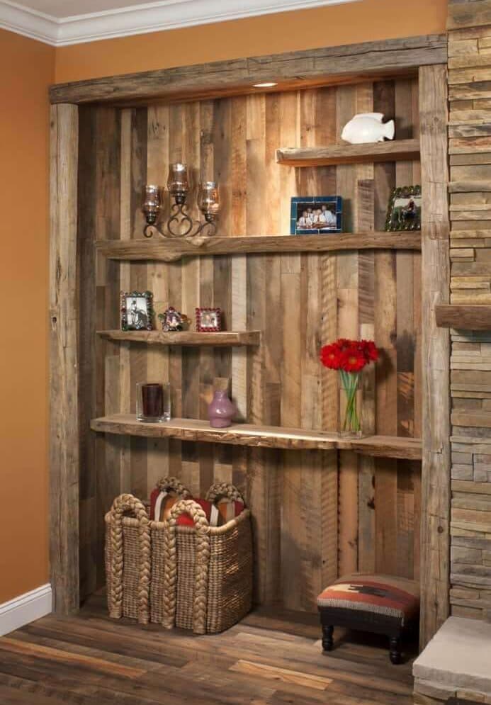 Reclaimed wood wall cladding bookshelf accent wall in Flat Rock North Carolina home.