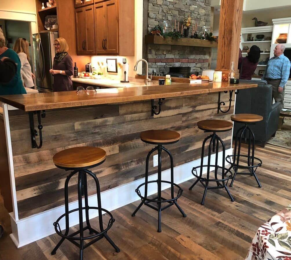 Reclaimed wood bar top in home kitchen.
