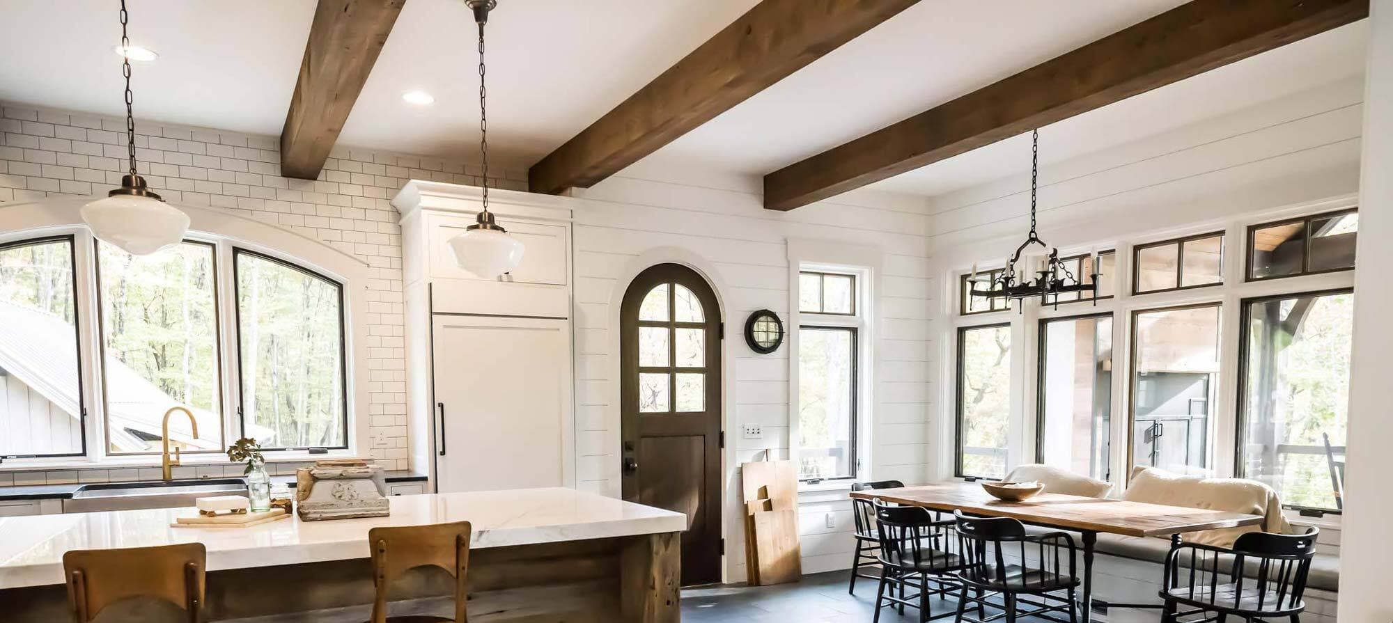 Stunning rustic reclaimed ceiling beams in kitchen.