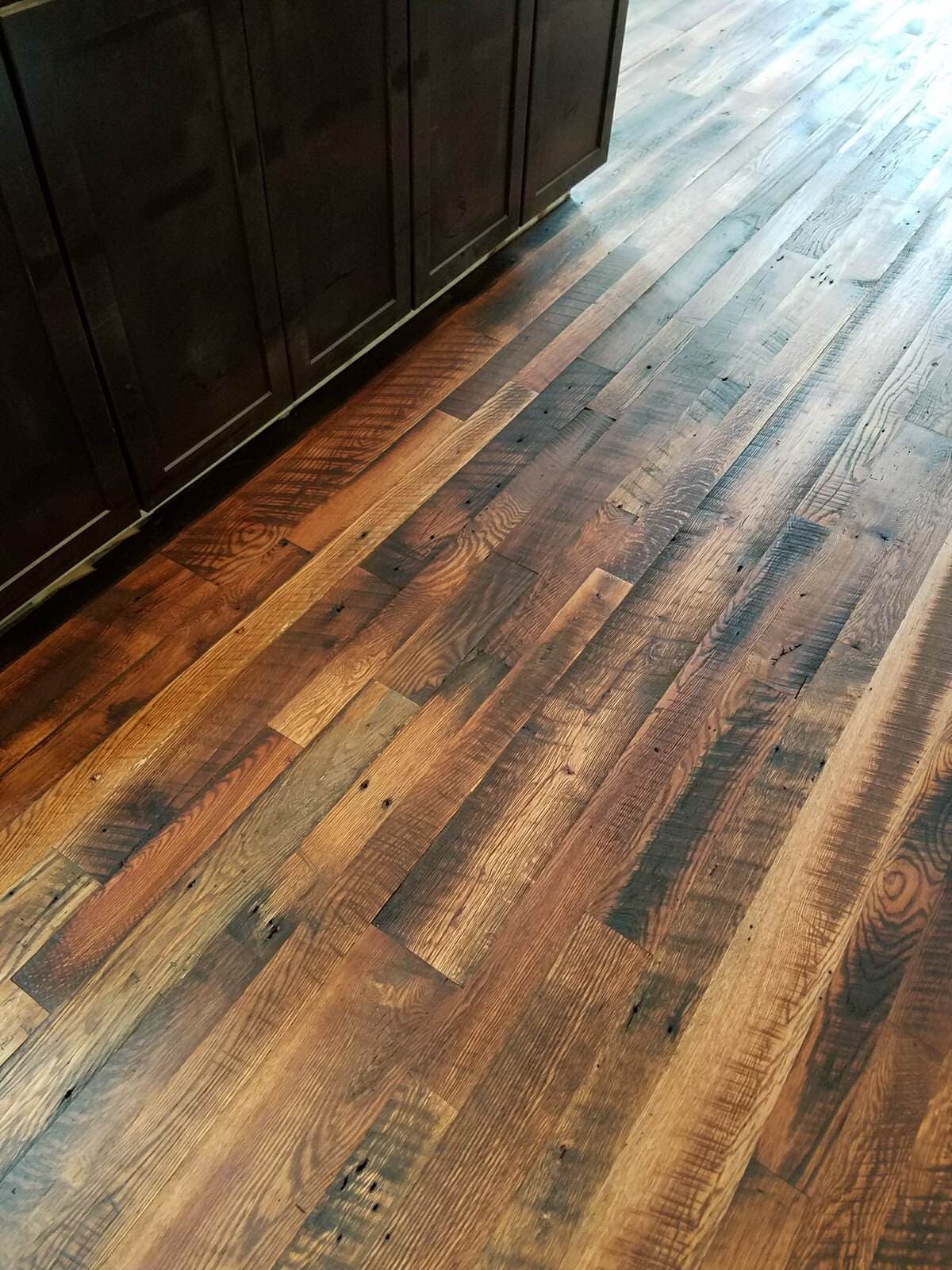 Rustic oak flooring in kitchen floor.