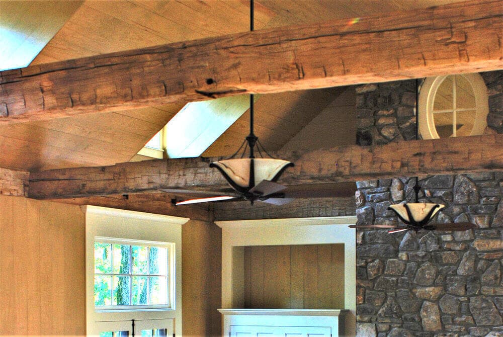 Hand hewn solid wood ceiling beams featured in Hendersonville NC home.