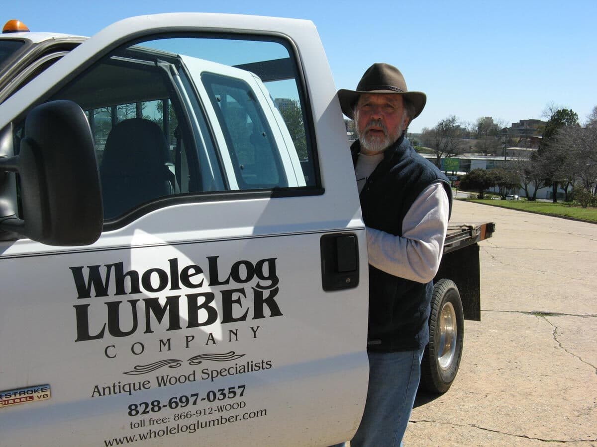 Jim Stowell getting into Whole Log Lumber truck.