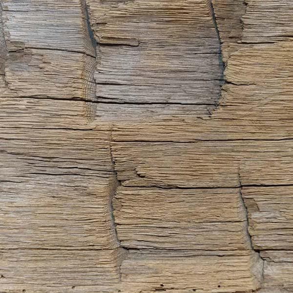 Hand hewn surface texture for reclaimed wood.