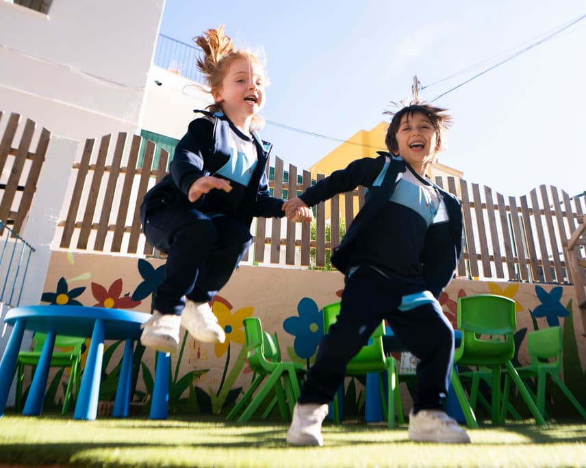 SAN students happy jumping