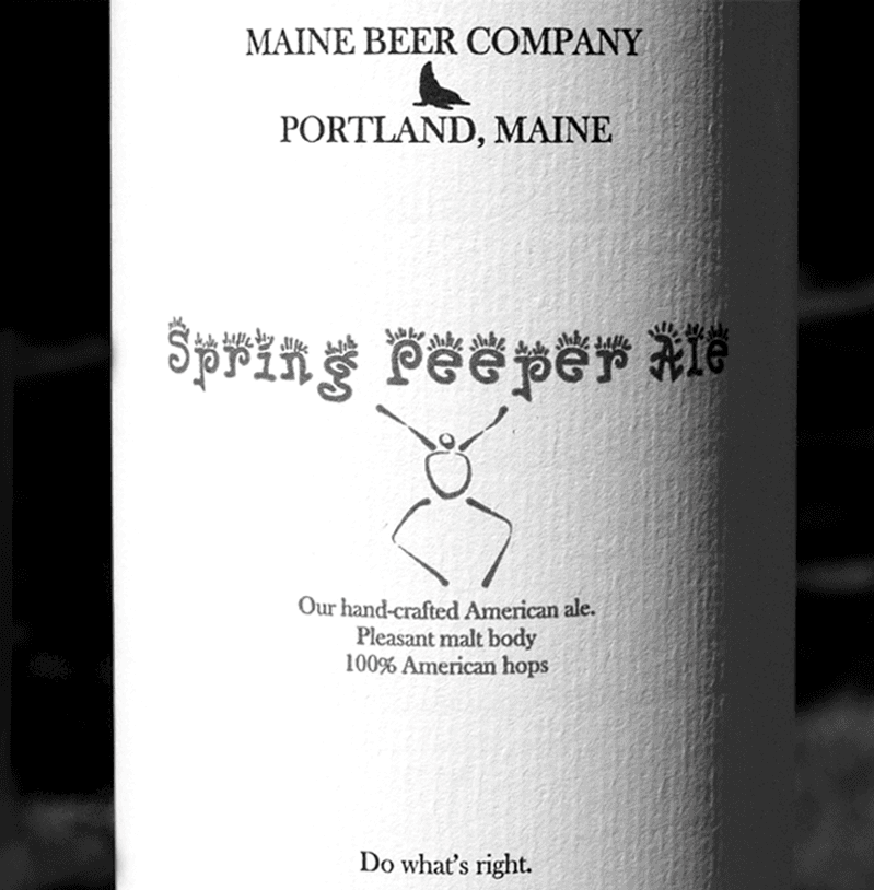 A black and white photo of the original bottle of Peeper, then called "Spring Peeper Ale."