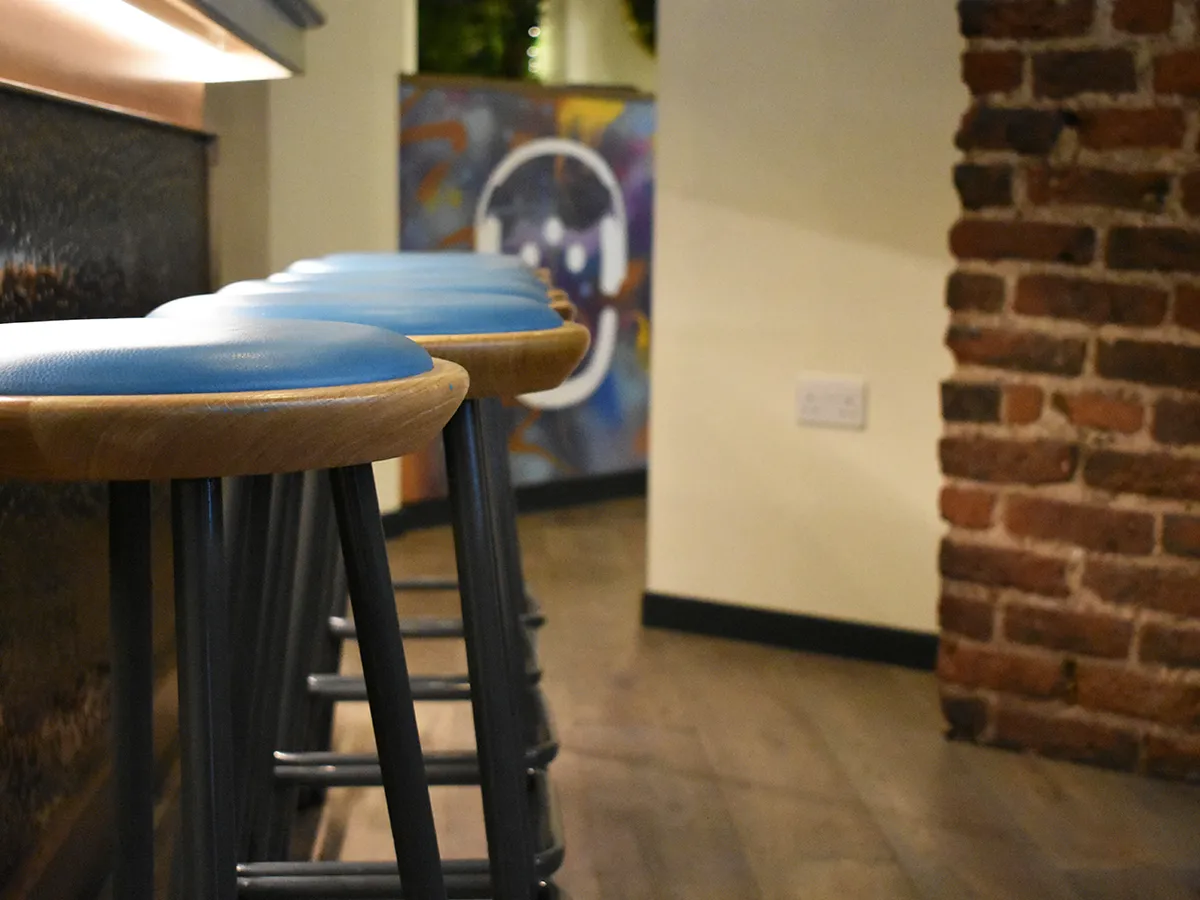 Bowls Restaurant Soho Minsk Stools By The Bar Four Legged Metal And Wooden Stools With Upholstered Seat Pad