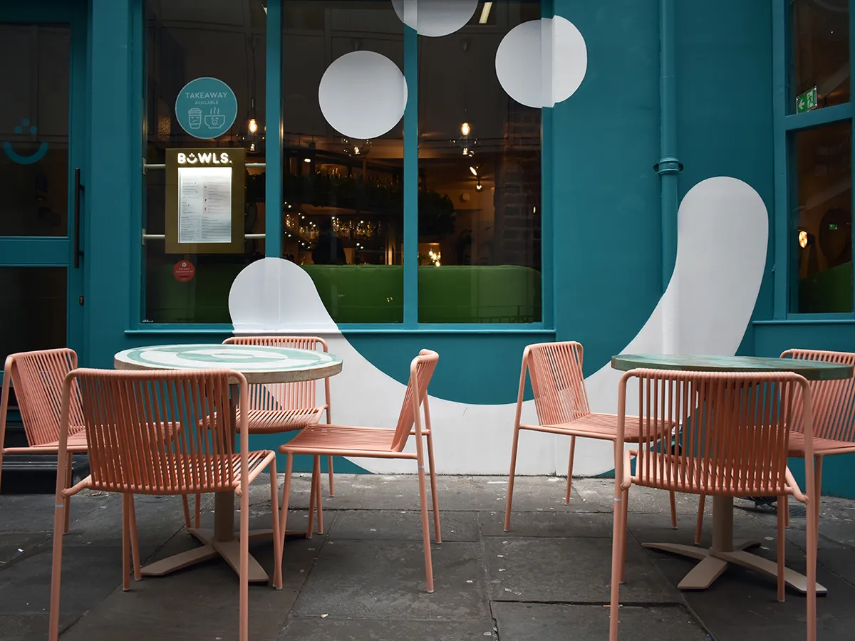 Bowls soho restaurant with outdoor furniture and recycled table tops by insideoutcontracts08