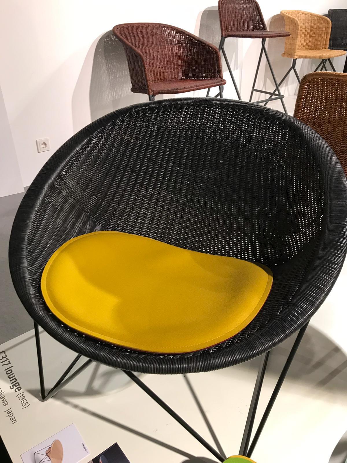 IMM-Cologne-2019-rattan-lounge-chair-in-black-with-contrasting-seat.JPG#asset:180293