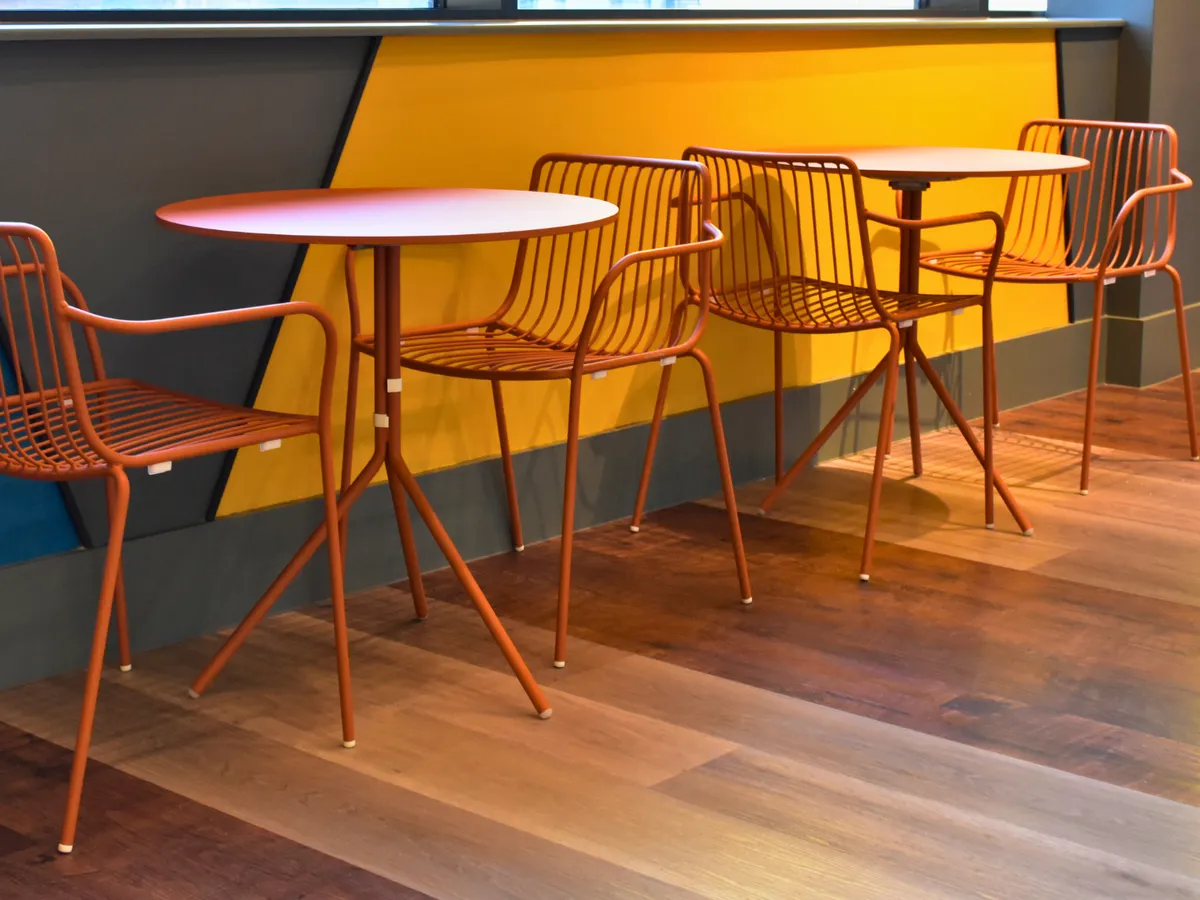Modern Orange metal stackable chairs