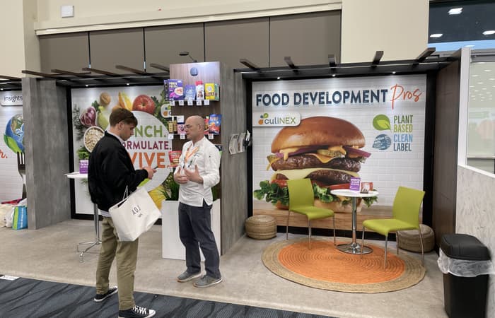 Expo West 2023, vibrant booth showcasing the latest in plant based and clean label foods.