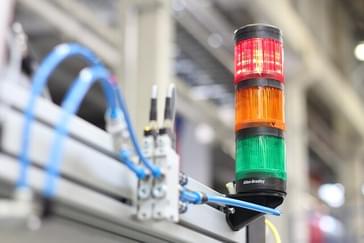 Green, yellow and red light in a manufacturing facility to show efficiency.