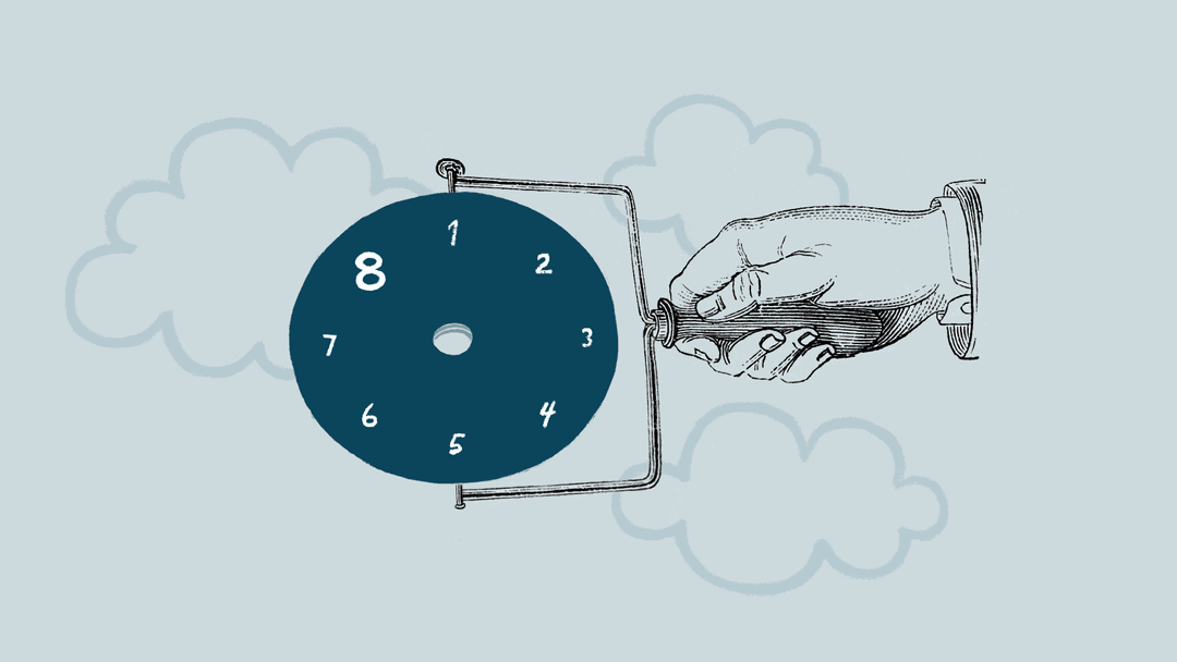 An illustration of a hand holding a spin wheel with 1 thru 8 on it