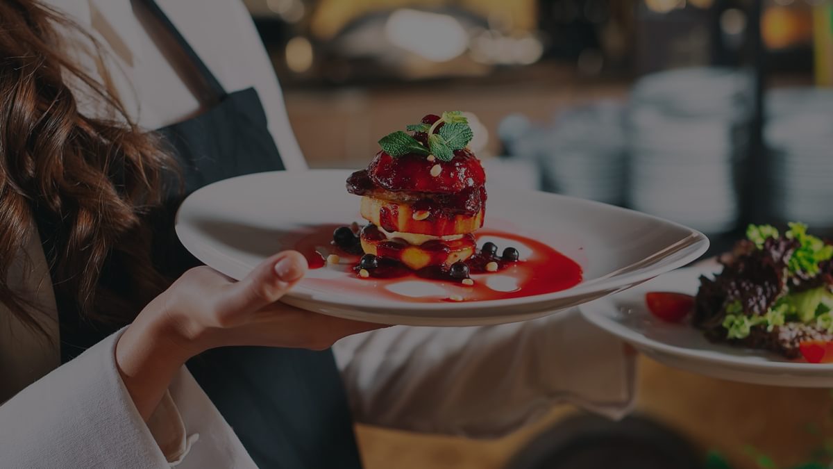 A woman service finger food