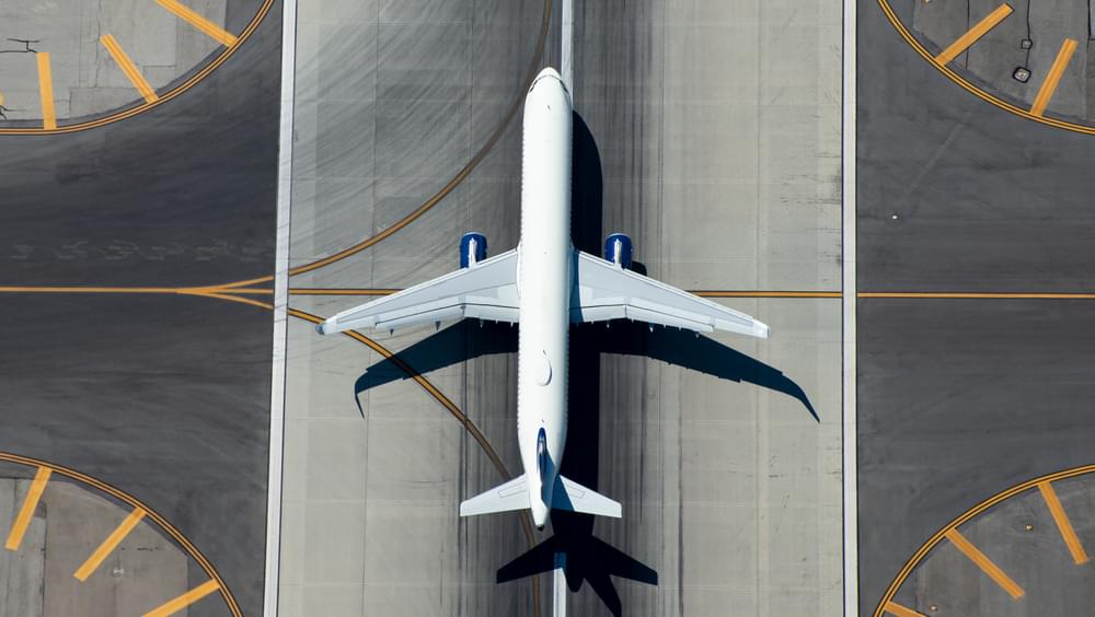 Aerial view of aeroplane on runway
