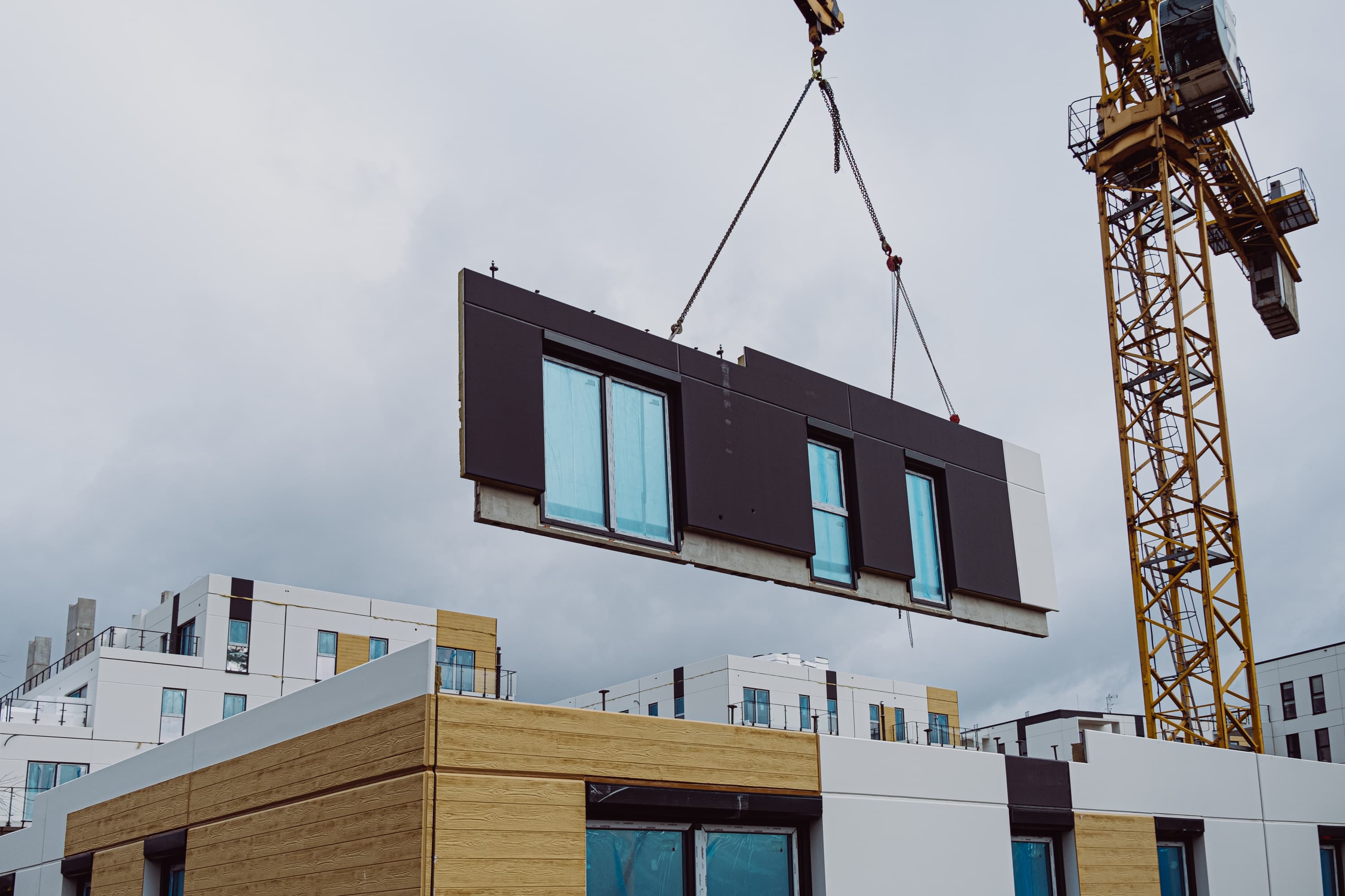 Crane lifting modular building panel