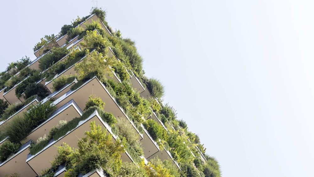 Green skyscraper with planting on balconies