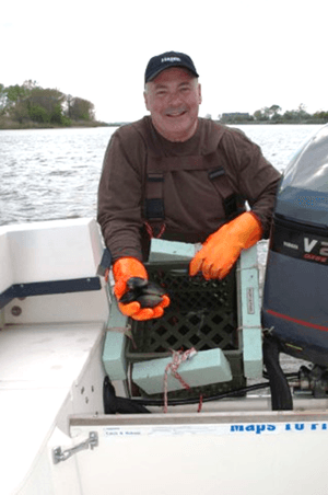 Hazen TRWRA Project Manager and New Jersey Office Manager Bill Gettings presents Cherrystone Hard Clams from the Shrewsbury River. The Pleasure Bay Crossing and Main Pump Station Replacement project will protect this environmental resource for future generations' use.