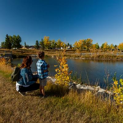 Mother and son playground and trail by river 14