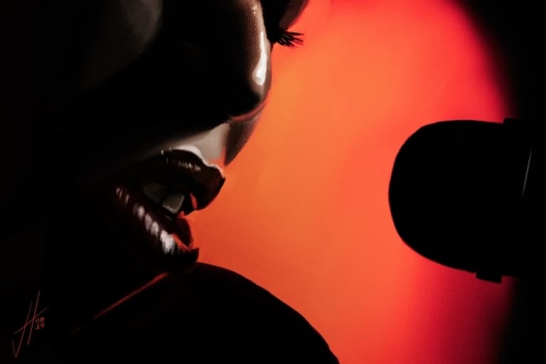 Image shows a still from the film, The Warriors. It's a close-up shot of "The DJ", a black woman is speaking in to a microphone. Her face is partly silhouetted against an orange spotlight in the background. s