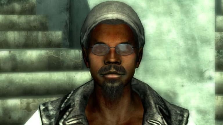 A still from the computer game, Fallout. Image shows the radio DJ Three Do, a black male character, facing head on from the shoulders up.
