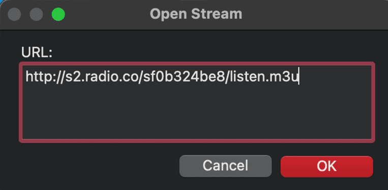 A screenshot showing the Open Stream Window in Apple Music, along with a stream URL pasted in it.