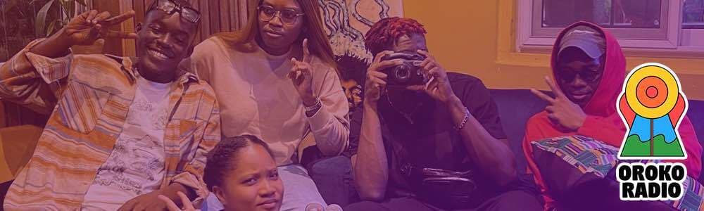 Oroko Radio team, a group of young black people, smiling and posing towards the camera while sitting on a sofa. The Oroko Radio Logo is in the bottom right corner.