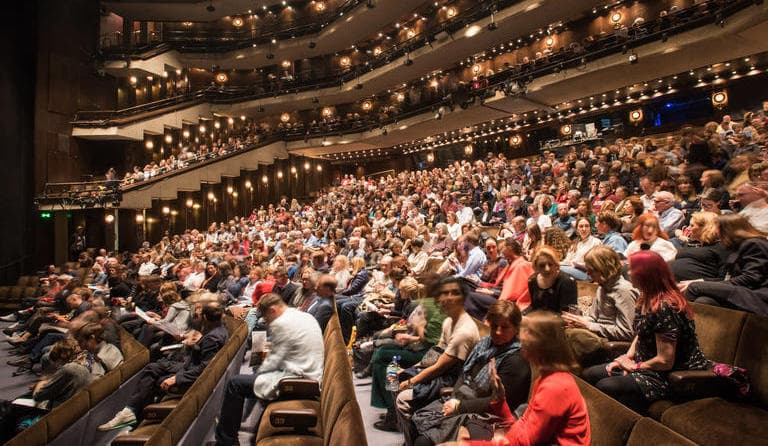 Audience at Barbican's performing arts theatre
