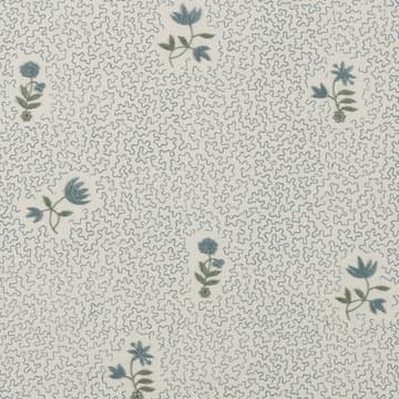 Wild flower on printed squiggles in antique blue
