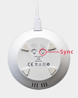 Synkroniseringsknap bag på HT400 termostat