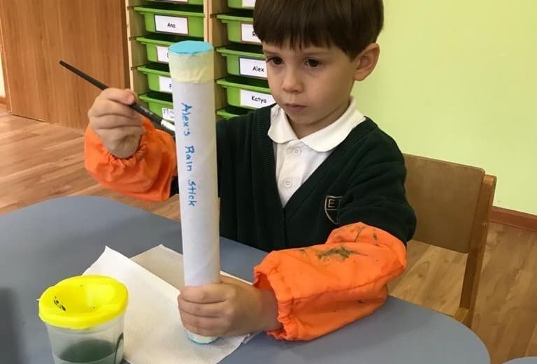 Aleks and a rain stick