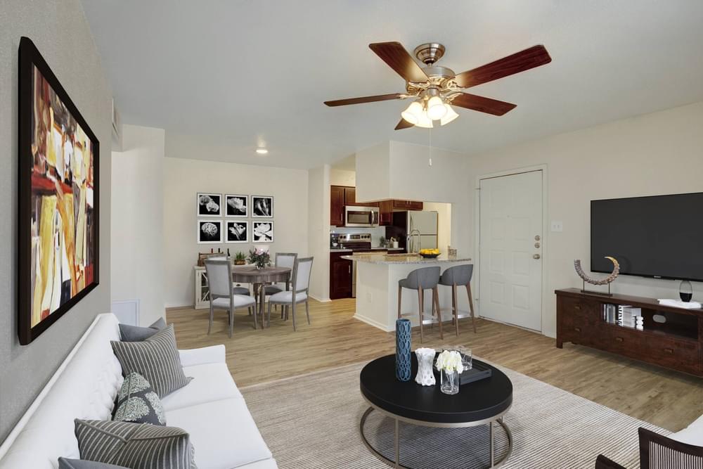 Village Green apartments Open floor layout with view of living, dining, and kitchen area.