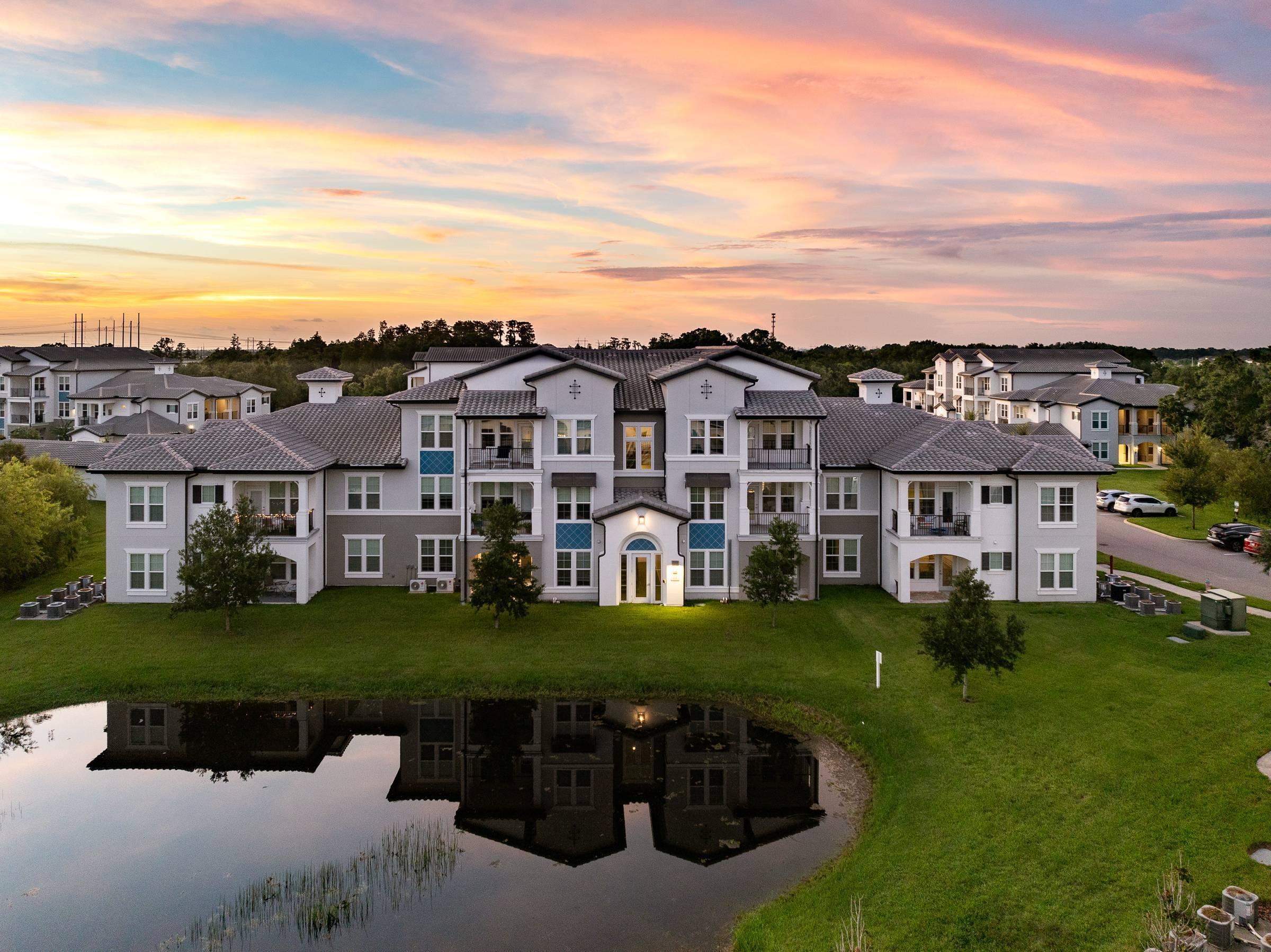 Shadetree Apartments aerial of community buildings & lagoon