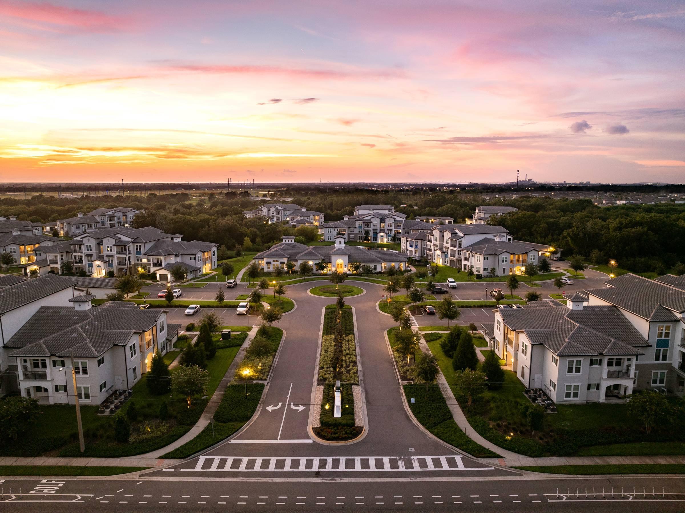 Shadetree Apartments aerial of community buildings at dusk